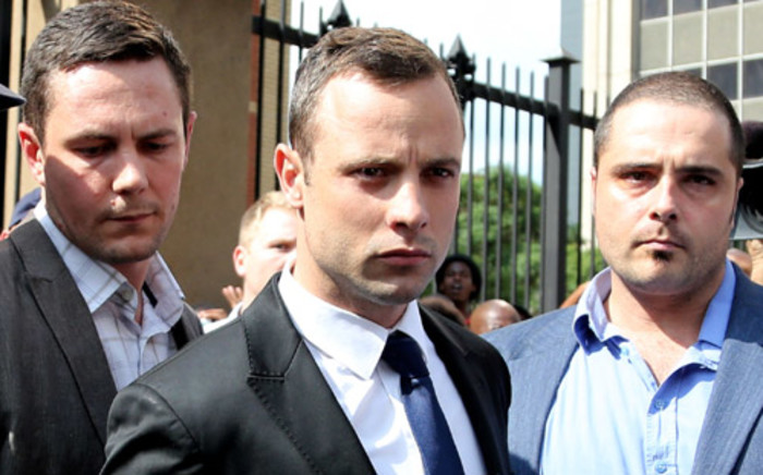 Oscar Pistorius leaving the High Court in Pretoria after day four of his trial on 6 March 2014. Picture: Sebabatso Mosamo/EWN.