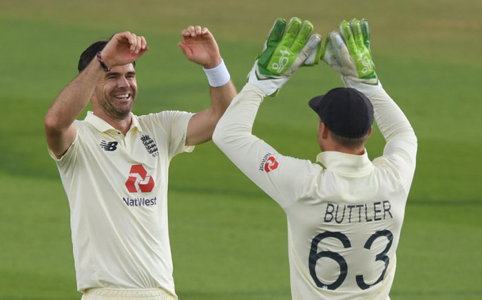 England's James Anderson celebrates the wicket of Pakistan's Azhar Ali with Jos Buttler on the first day of the second Test cricket match between England and Pakistan at the Ageas Bowl in Southampton, southwest England on 13 August 2020. Picture: AFP