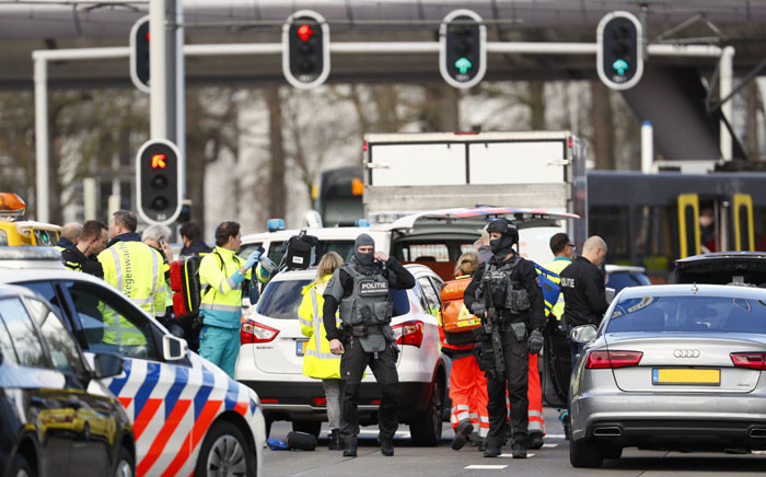 Police forces stand at the 24 Oktoberplace in Utrecht, on 18 March 2019 where a shooting took place. Picture: AFP