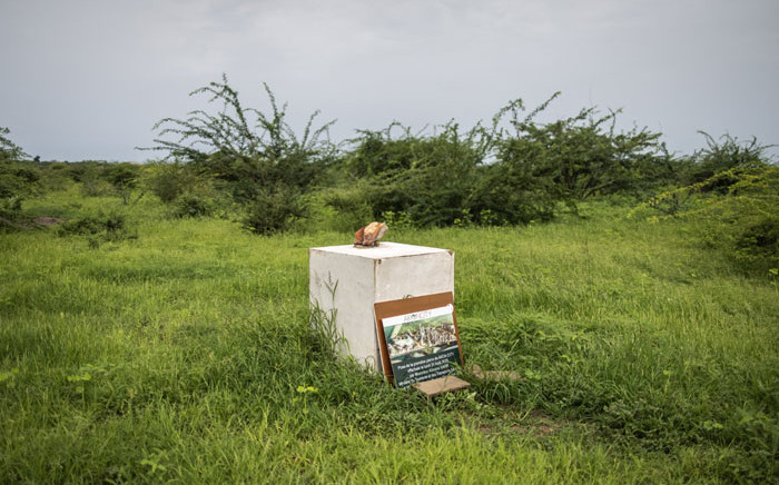 The stone to commemorate the start of construction of 'Akon City' is pictured in Mbodiene on 30 August 2021. One year after rapper, Akon, laid the first stone of his six billion dollar city outside the small seas side village of Mbodiene, the site remains empty. Picture: JOHN WESSELS/AFP