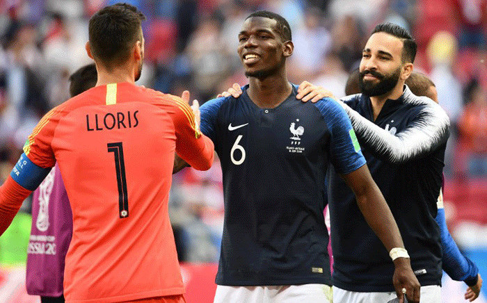 France's goalkeeper Hugo Lloris, France's midfielder Paul Pogba and France's defender Adil Rami celebrate at the end of the Russia 2018 World Cup Group C football match between France and Australia at the Kazan Arena in Kazan on 16 June, 2018. Picture: AFP