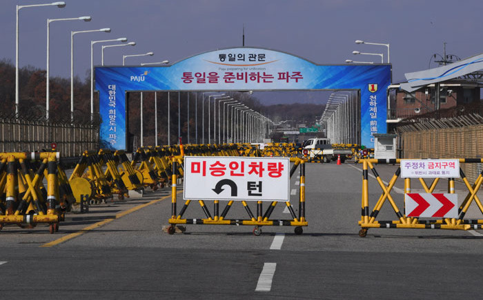 A barricade is set on the road leading to the truce village of Panmunjom at a South Korean military checkpoint in the border city of Paju near the Demilitarized Zone (DMZ) dividing the two Koreas on November 14, 2017. Picture: AFP