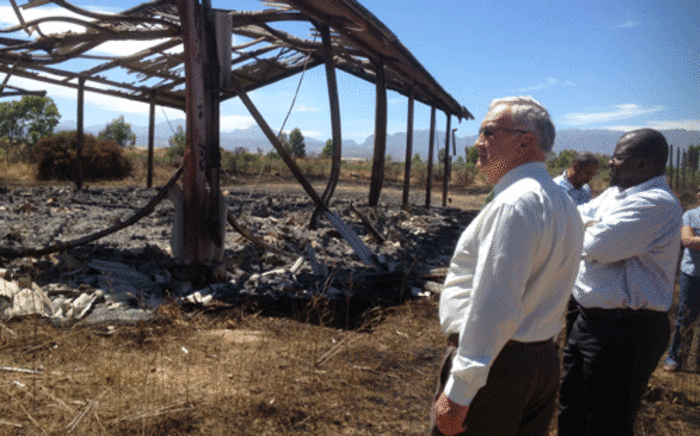 Western Cape Agriculture MEC Gerrit van Rensburg inspects a farm which was torched during a farmworkers strike in Ceres. Picture: Regan Thaw/EWN