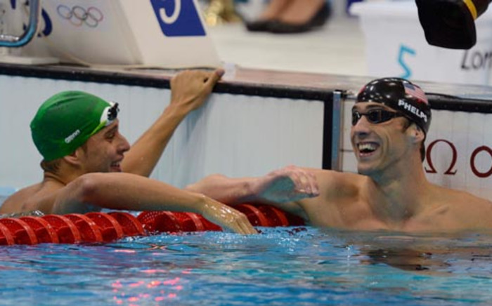 Runner-up Chad Le Clos (L) and winner Micahel Phelps after they swam in the men’s 100 metres butterfly final on 3 August, 2012, at the London Olympic Games. Picture: Wessel Oosthuizen/SA Sports Picture Agency.