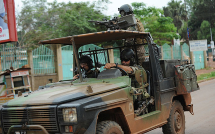 FILE: This file photo shows French soldiers patrol through the streets of Bangui, the capital and largest city of the Central African Republic on 6 December 2013. Picture: AFP