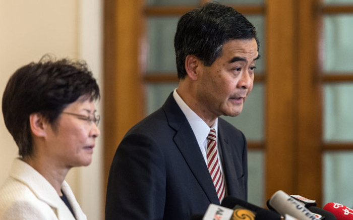 FILE: Hong Kong’s embattled leader, Chief Executive Leung Chun-ying (R) and Chief Secretary Carrie Lam. Picture: EPA.