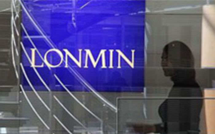 Lonmin said it produced 215,117 ounces of platinum in concentrate, down 41 percent from a year earlier.