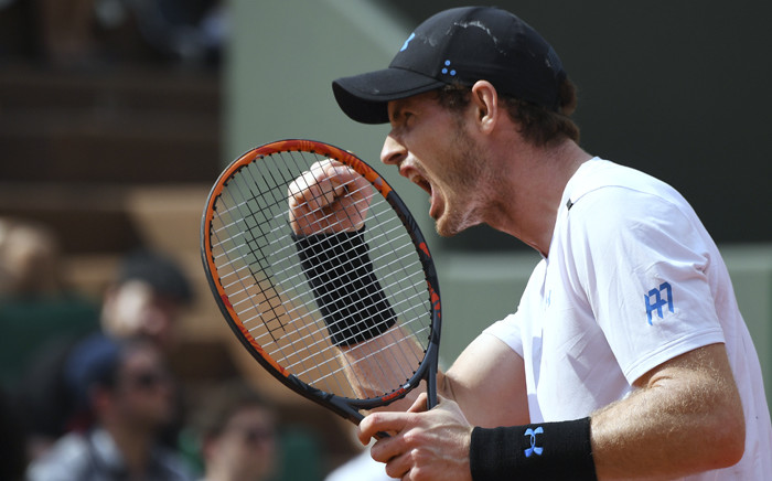 FILE: Britain's Andy Murray celebrates after scoring during his tennis match against Slovakia's Martin Klizan at the Roland Garros 2017 French Open on 1 June 2017 in Paris. Picture: AFP.