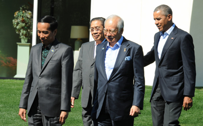 Indonesian President Joko Widodo (L, front) chats with Malaysian Prime Minister Najib Razak (C, front), as US President Barack Obama (R) and ASEAN Leaders walk together before a group photo on the second day of the US-ASEAN Summit at Sunnylands in Rancho Mirage, California, USA, 16 February 2016. Picture: EPA/NED REDWAY.