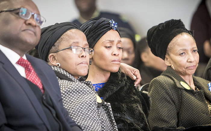 FILE: Gugu Zulu's widow Letshego is comforted by her mother while Zulu's mother Puleng sits alongside at his memorial at Kyalami race track. Picture: Thomas Holder/EWN. Picture: Thomas Holder/EWN.