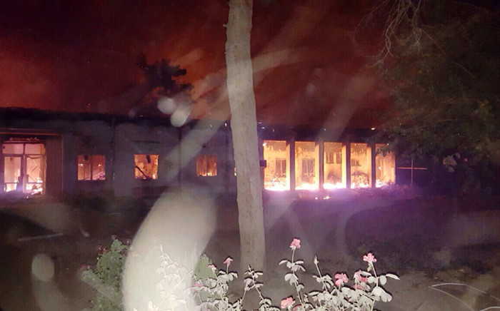 In this photograph released by Medecins Sans Frontieres (MSF) on 3 October, 2015, fires burn in part of the MSF hospital in the Afghan city of Kunduz after it was hit by an air strike. Picture: AFP.