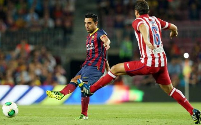 Barcelona midfielder Xavi playing against Atletico Madrid earlier this season. Picture: Facebook.com