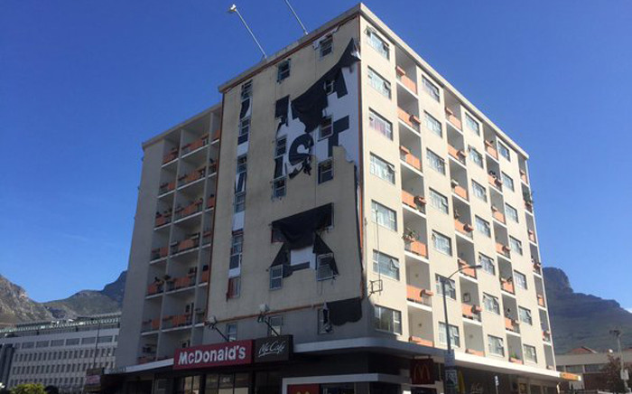 The billboard was also been deemed illegal by the City of Cape Town. Picture: Xolani Koyana/EWN.