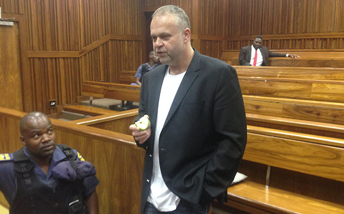 Czech fugite Radovan Krejcir takes a break during a court appearance at the Johannesburg High Court. Picture: Vumani Mkhize/EWN.
