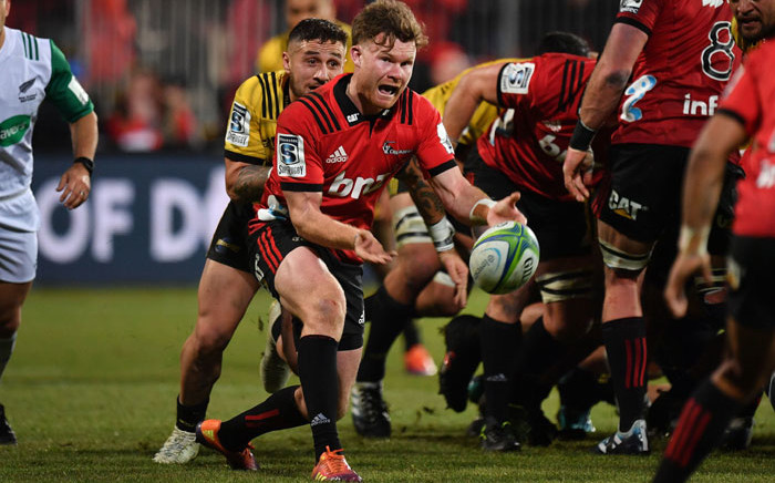 The Crusaders' Mitchell Drummond passes the ball during the Super Rugby semifinal match against the Hurricanes in Christchurch on 29 June 2019. Picture: AFP