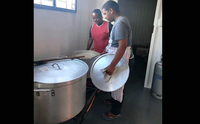 Philisa Abafazi Bethu volunteers cooking meals for vulnerable residents around Cape Town. Picture: Philisa Abafazi Bethu/Facebook.