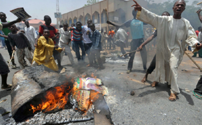 People demonstrate in Nigeria's northern city of Kano where running battles broke out between protesters and soldiers. Picture: AFP