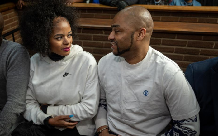 Thabo Bester and his girlfriend Nandipha Magudumana exchange whispers and held hands in the dock during court session on 8 August 2023. Picture: Katlego Jiyane/Eyewitness News 