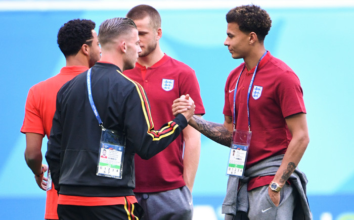England's midfielder Dele Alli (R) greets Belgium's defender Toby Alderweireld before their Russia 2018 World Cup play-off for third place football match between Belgium and England at the Saint Petersburg Stadium in Saint Petersburg on 14 July 2018. Picture: AFP. 
