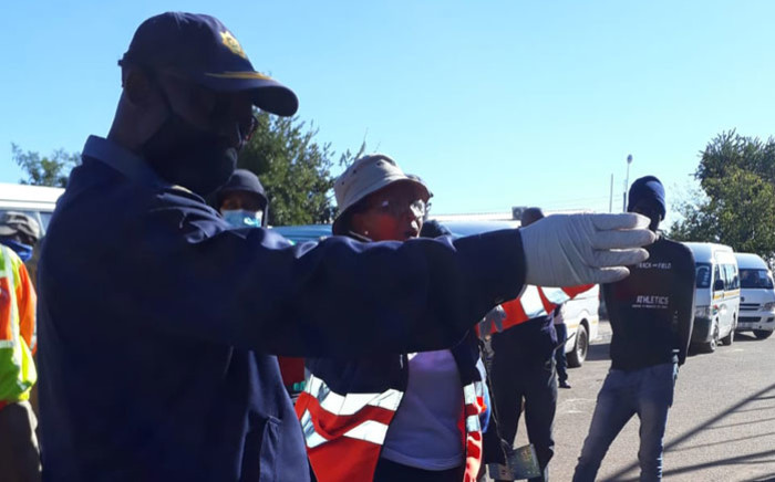 Gauteng Police Commissioner Elias Mawela (front) and Community Safety MEC Faith Mazibuko (back) lead a law enforcement operation in the south of Johannesburg to ensure compliance with lockdown regulations on 30 April 2020. Picture: @SAPoliceService/Twitter