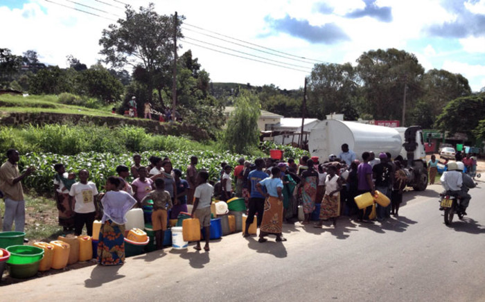 Residents of Blantyre queue for safe drinking water on 21 January 2015 after floods contaminated the local water supply. Picture: Aletta Gardner/EWN
