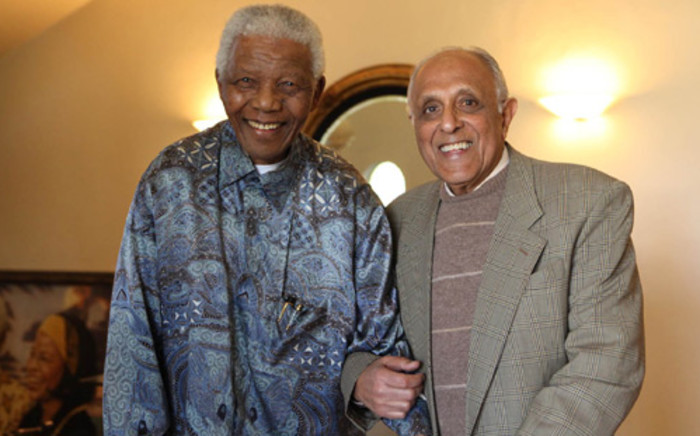 FILE PHOTO: Former president Nelson Mandela joins anti-apartheid veteran Ahmed Kathrada on the eve of his 80th birthday in Houghton, Johannesburg on Thursday 20 August 2009. Picture: Nelson Mandela Foundation