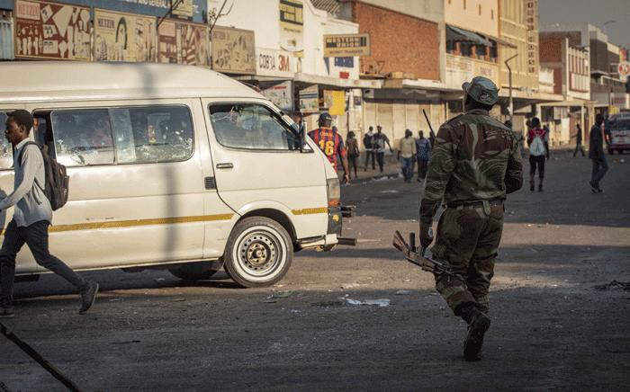 Army officials patrolled the streets during election protests in Zimbabwe on 1 August 2018. Picture: Thomas Holder/EWN