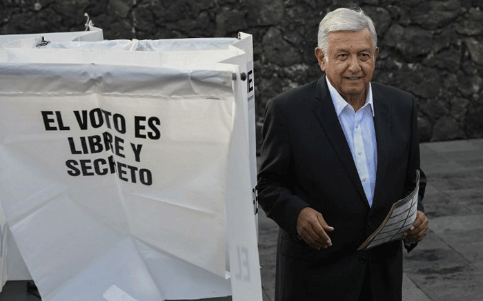 Mexico's new president Andres Manuel Lopez Obrador for the "Juntos haremos historia" party, casts his vote during general elections, in Mexico City, on 1 July, 2018. Picture: AFP.