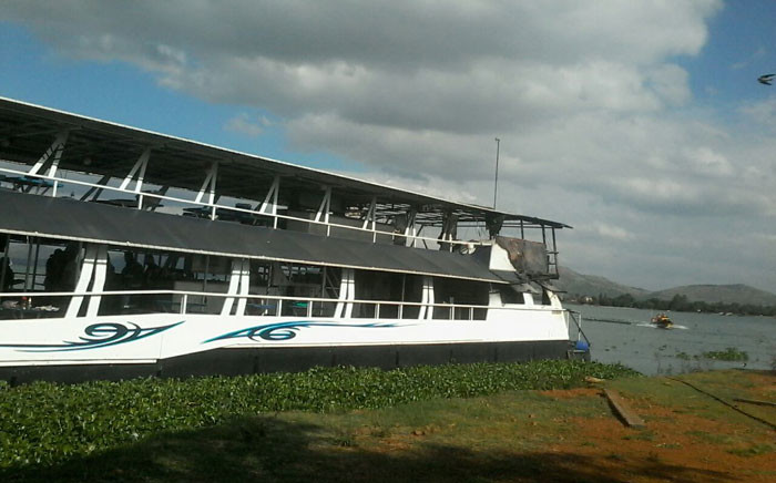 A party boat ferrying about 200 people caught fire at the Hartbeespoort Dam. Picture: iWitness.