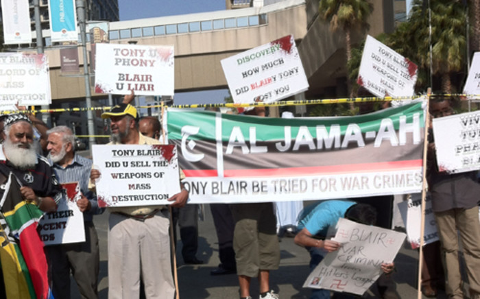Al Jama-ah protests outside the Sandton Convention Centre against former British Prime Minister Tony Blair during the 2012 2012 Discovery Invest Leadership Summit. The group wants Blair to be tried for his support of the US invasion of Iraq. Picture: Tumisang Ndlovu/Eyewitness News.