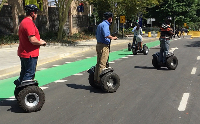 The 702 team on their Segways during day one of the Ecomobility Festival in Sandton. Picture: Vumani Mkhize/EWN.