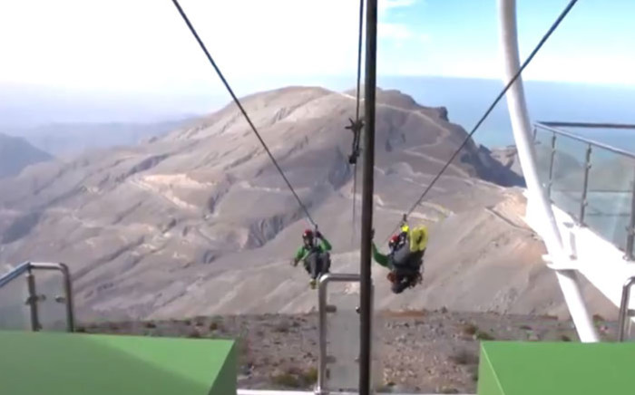 A screengrab of thrill seekers doing the world's longest zipline in the Jebel Jais in Ras Al Khaimah in the United Arab Emirates. Picture: @lovindubai/Twitter