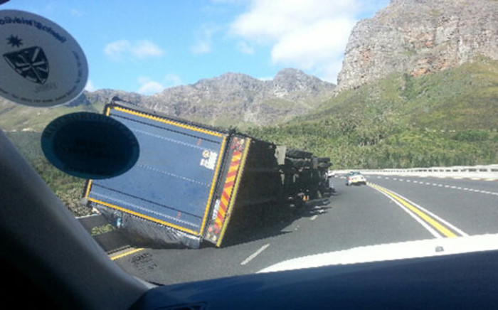 A truck was blown over by gale force winds on the N1 in the Western Cape on 30 November 2012. Picture: Juanita Bloemetjè/iWitness.