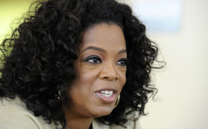 US talk show queen Oprah Winfrey answers to journalist's questions at her South African girls' academy on January 13, 2012 in Henley on Klip. Winfrey founded the $40-million school for girls in 2007. Picture: AFP.