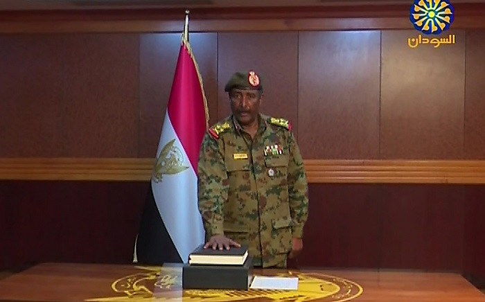 FILE: A grab from a broadcast on Sudan TV shows Lieutenant General Abdel Fattah al-Burhan Abdulrahman taking oath on 12 April 2019 as chief of the new military council, in the capital Khartoum. Picture: AFP