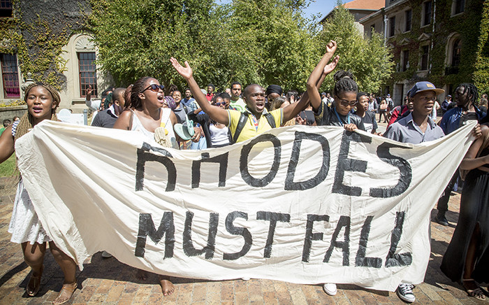 Using the slogan "Rhodes Must Fall" some students are demanding the Cecil John Rohodes statue must be taken down on the University of Cape Town's campus, as it represents institutional racism. Picture: Thomas Holder/EWN.