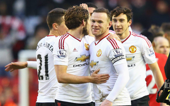 Manchester United captain Wayne Rooney celebrates with his team mates after their victory against West Ham United in the FA Cup tie at Upton Park in the quarter-final replay. Picture: Manchester United official Facebook.