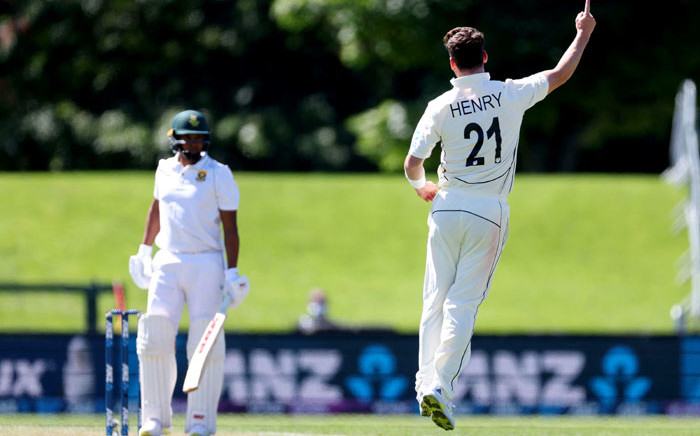 New Zealand's paceman Matt Henry (R) celebrates the wicket of South Africa's Kagiso Rabada during day one of the first cricket Test match between New Zealand and South Africa at Hagley Oval in Christchurch on 17 February 2022. Picture: Marty MELVILLE/AFP