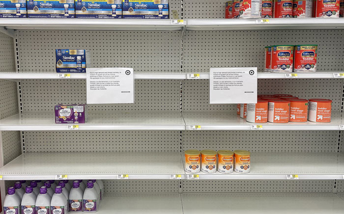 In this file photo taken on 16 May 2022 a sign stands next to a small amount of toddler nutritional drink mix at Target in Stevensville, Maryland as a nationwide shortage of baby formula continues due to supply chain crunches tied to the coronavirus pandemic that have already strained the country’s formula stock, an issue that was further exacerbated by a major product recall in February. Picture: Jim WATSON/AFP