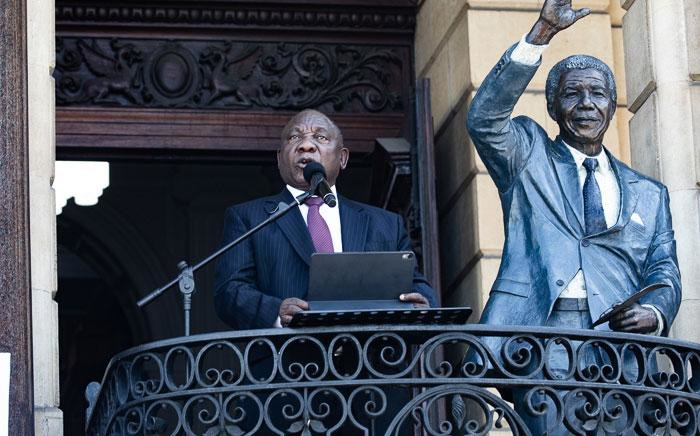 President Cyril Ramaphosa speaking on Cape Town's City Hall balcony at the 30th-anniversary parade of the release of former president Nelson Mandela who was jailed for 27 years. Picture: Kayleen Morgan/EWN