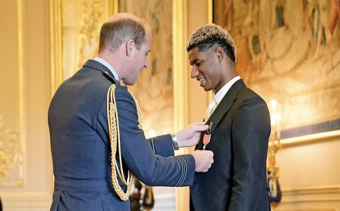 Manchester United forward Marcus Rashford was given an MBE (Member of the Order of the British Empire) medal at a Windsor Castle ceremony by Prince William on 9 November 2021. Picture: @KensingtonRoyal/Twitter.