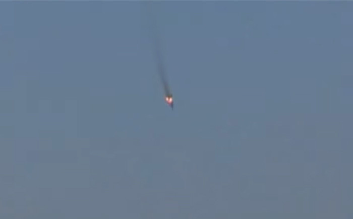 A screengrab shows a Russian-made SU-24 fighter jet after being shot down by Turkey near the Syrian border.