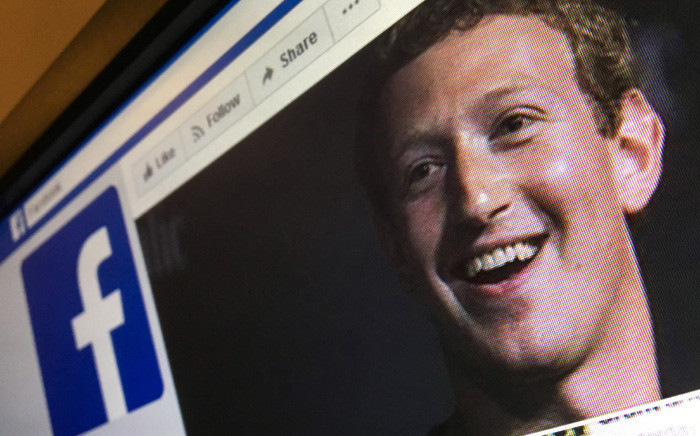 A picture taken on 22 March 2018 shows an illustration picture featuring Facebook founder and CEO Mark Zuckerberg who issued a public apology for the hijacking of personal data from millions of people. Picture: AFP.