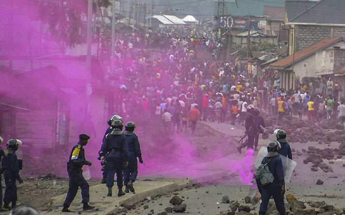 Flares are launched by DRCongo police forces during a demonstration in Goma on 19 September 2016. Picture: AFP. 