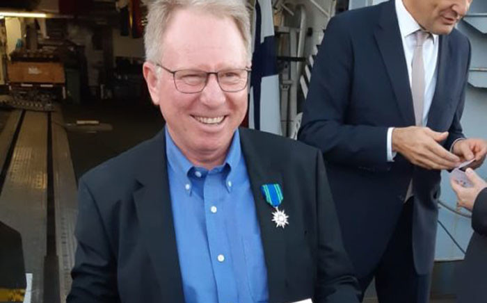 The National Sea Rescue Institute's (NSRI) Craig Lambinon smiles after receiving the Knight in the Order of the Maritime Merit. Picture: nsri.org.za