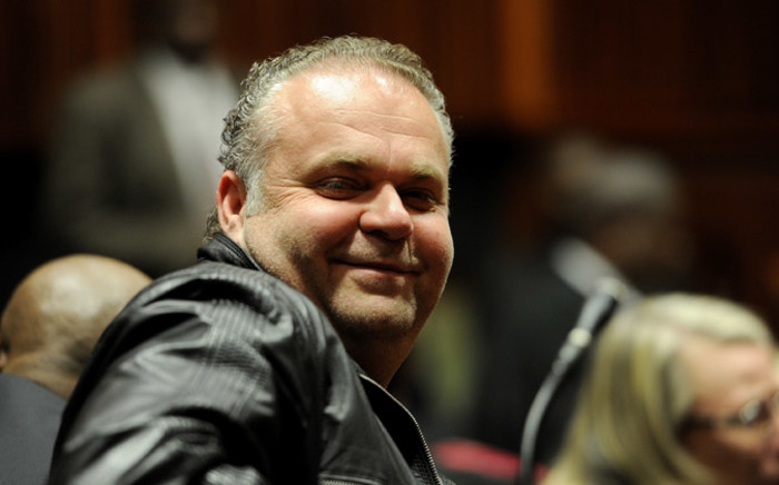 FILE: Czech fugitive, Radovan Krejcir, smiles ahead of his court case at the Johannesburg High Court sitting at Palm Ridge Magistrates Court. Picture: Sapa. 
