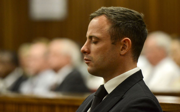 Oscar Pistorius is seen at the High Court in Pretoria on 21 October 2014. He was sentenced to five years imprisonment for the culpable homicide killing of his girlfriend Reeva Steenkamp. Picture: Pool.