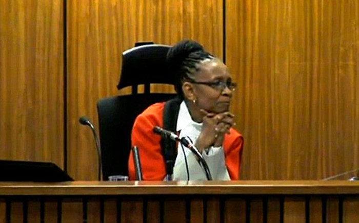 FILE: Judge Thokozile Masipa listens to evidence during the Oscar Pistorius murder trial at the High Court in Pretoria on 9 May 2014.