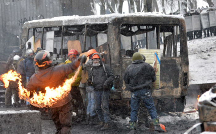 FILE: Protesters clash with police in the center of Kiev on 22 January. Picture: AFP.