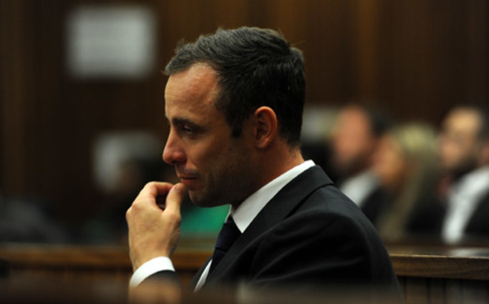 Murder accused Oscar Pistorius sits in the dock at the High Court in Pretoria on 12 March 2014. Picture: Pool.